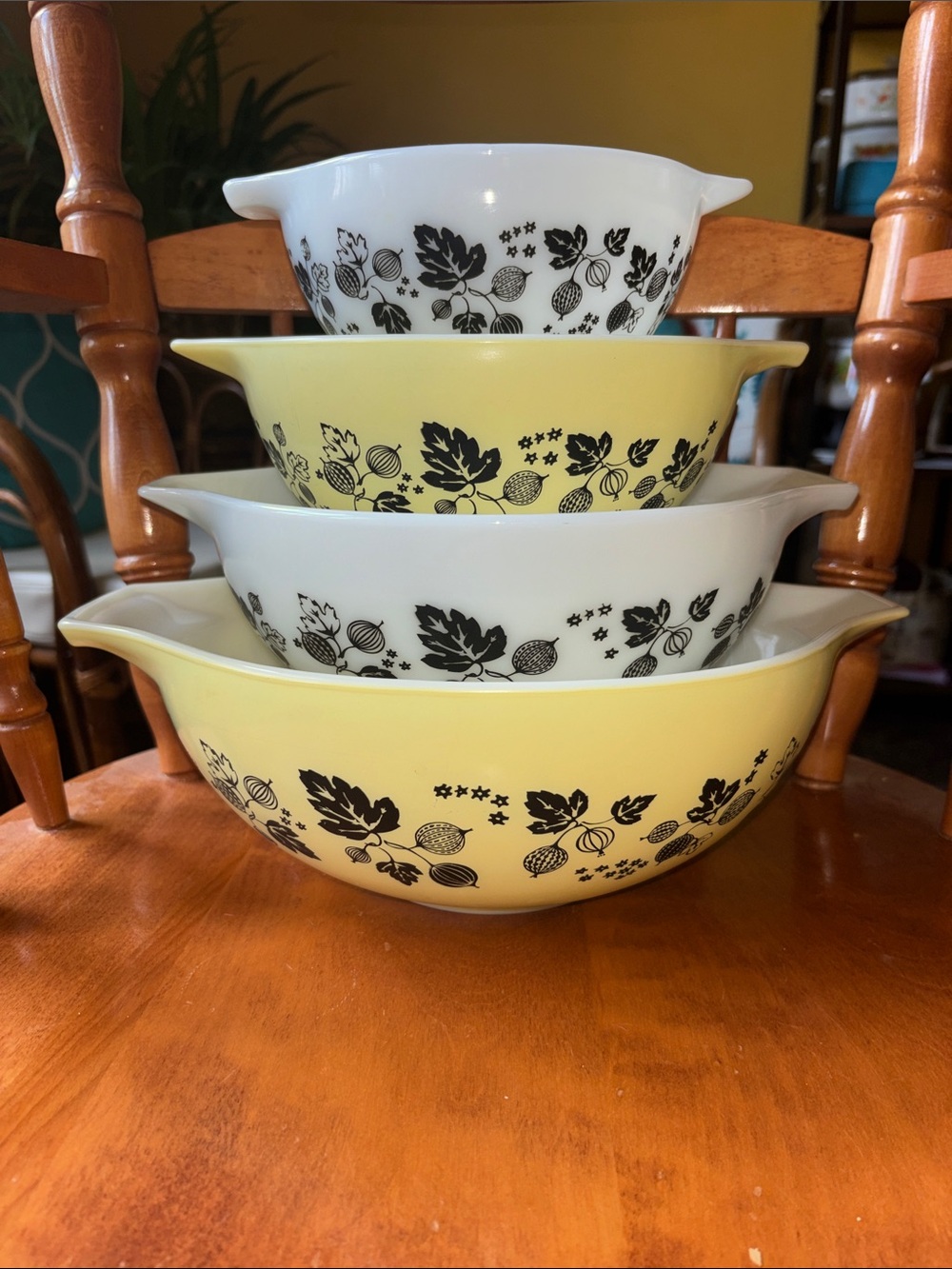 Pyrex Yellow and White Nesting Mixing Bowls with Black Fruit Pattern
